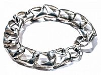 Close-up photo of the vintage sterling silver bracelet showing the interlocking twisted chain links and clasp