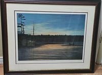 Frontal view of the framed print showing the artwork, its colors, frame, and matting.