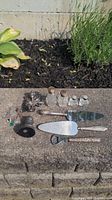 Various items including silver handled utensils, glass salt and pepper shakers, charm bracelet, pewter item, and detached cherub figurine.