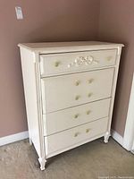 Another angled side view showing the dresser sturdiness and paint condition.