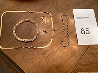 Overview of all jewelry items on table