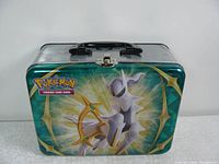 Front of Pokemon trading card game tin featuring Arceus.