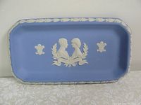 Full view of rectangular Wedgwood jasperware dish in light blue and white relief decorations.