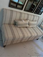 Front view of bench with two pillows
