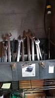 Photo of wrenches standing inside the Tuff Box toolbox showing size and condition