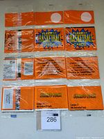 Three unopened Fleer 94/95 basketball card rack packs in orange packaging, two labeled Series 2, one labeled Jumbo Pack containing 21 cards.