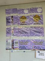 Photo of three unopened 1994-95 Fleer Ultra Retail Jumbo Rack Packs displayed unfolded to show packaging details and branding.