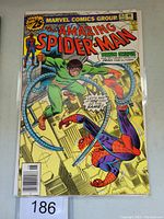 Front cover of Amazing Spider-Man #157 showing Spider-Man fighting Doctor Octopus with his mechanical arms, Marvel Comics Group logo present, marked issue number 157 June 1976.