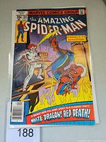 Photo of the front cover of Amazing Spider-Man #184 comic book showing Spider-Man and villain White Dragon in an action scene.