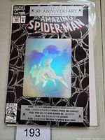 Front cover view showing the holographic Spider-Man image with 30th anniversary text and issue details.
