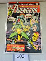 Front cover of the Avengers #135 comic book showing Ultron holding Vision, with Iron Man and Thor, published by Marvel Comics, May 1975.
