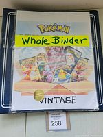 Binder cover showing Pokemon-themed printed insert labeled “Whole Binder Vintage.”