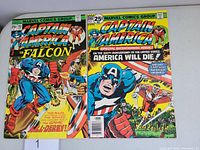 Front covers of Captain America #196 (featuring Captain America and Falcon) and Captain America #200 (special bicentennial issue) comics with price 25 cents each and Marvel Comics Group header.