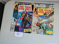 Front covers of James Bond For Your Eyes Only #1 and #2 Marvel comic books displayed side by side on a white surface.