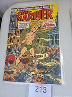 Front cover of Sub-Mariner #25 comic book showing Sub-Mariner character in green costume fighting in an underwater environment with other fallen characters, priced at 15 cents, issue May 1970.