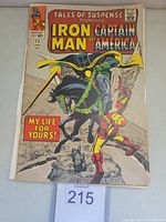 Front cover of Tales of Suspense #73 vintage Marvel comic book showing Iron Man and Captain America with clear view of issue number, price and date.
