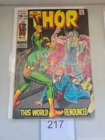 Front cover of Thor #167 comic book showing Thor and Loki with a man in blue suit, priced 15 cents, issue date August 1969, Marvel Comics Group
