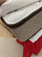 Close-up of mattress top quilting and brown side panel