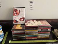 Two stacks of CDs and one Rebecca DVD in the Criterion Collection case in front