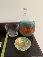 Front view of all three glass items together showing relative sizes and styles