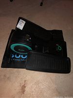 Front angled view showing pedals and Cubii logo on side.