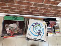 Photo showing vinyl LP records including 'Scottish Dance Time' by Stan Hamilton and The Clansmen, and 'The Unicorn' by The Irish Rovers.
