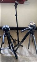 Overview of the three tripods standing on floor: Velbon 6200DX, Quantaray QSX-Digi Pro 8500, and Zedio Igenio phone tripod