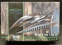 Front view of the sealed Batwing model kit box showing artwork of the Batwing aircraft from Batman Forever and Revell branding.