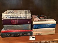 Stack of 8 Civil War related books showing titles and some wear.