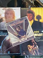 Photo showing five Rod Stewart vinyl albums laid out overlapping with visible album covers.