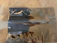 Two 8 GB DDR3 RAM sticks in electrostatic packaging