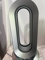 Front view of bladeless loop amplifier and base