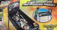 Photo of Arcade Alley Space Adventure themed free standing pinball machine showing detailed playfield and backboard artwork indicating electronic sounds, lights, and music features.