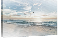 Front view of the 24x36 canvas print showing birds flying over ocean waves with a sky of clouds and soft light.