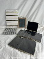 All items displayed including chalkboards, journal, bulletin board, and labels.