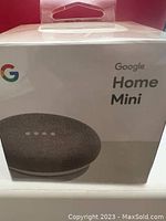 Front view of the Google Home Mini box showing product name and packaging.