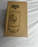 Box showing illustration and name 'Inhalation Mosquito Lamp'.