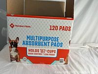 Box showing front with brand, quantity, and product features.