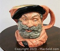 Front side view of Royal Doulton John Falstaff toby jug showing detailed facial features and color.