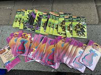 Lot of 41 new adhesive cloth kids patches featuring Teenage Mutant Ninja Turtles and Trolls characters shown in original packaging.