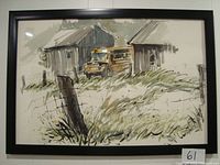 Full view of framed watercolour painting depicting a rural landscape with a yellow school bus between two buildings.