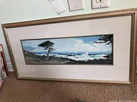 Full view of framed watercolor seascape painting