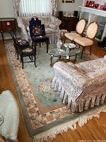Full view of rug in living room under furniture, showing overall pattern and size