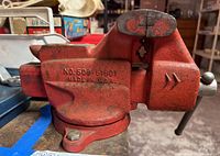 Side angle view of red Craftsman bench vise showing model number 508-61801 and Made in USA stamp.