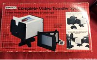 Photo showing the front of the Ambico Complete Video Transfer System box with product images and details.