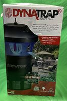 Front of box showing DYNA TRAP insect trap image, model DT1775, usage info and 1 acre coverage area.