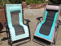 Photo showing both Timber Ridge chaise lounges side by side outdoors with visible color details and frame construction
