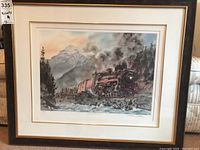 Full framed print showing the train and surrounding scenery with smoke and mountains.