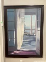 Frontal view of full painting and dark wood frame