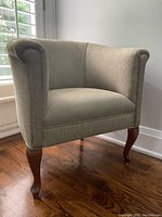 Front three-quarter view showing overall shape and upholstery